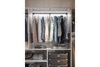 Anthracite pull-down wardrobe rail fitted inside a wardrobe with hanging clothes