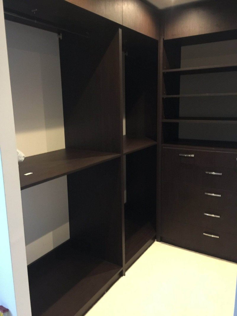 Walk-in wardrobe with drawers and rails